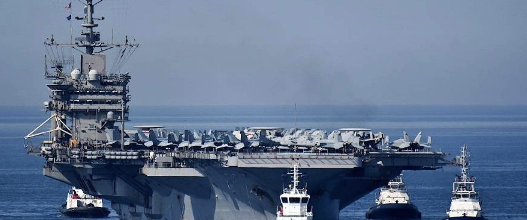 حاملة طائرات أميركية تصطدم بسفينة تجارية